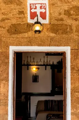 a doorway to a room with a wall with a mirror at Hara's Traditional Detached House in Malona in Malona Village