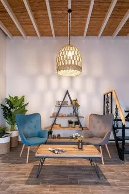 a living room with two chairs and a coffee table at Casa di Giorgio in Kattavía