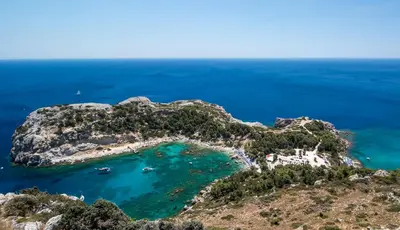 an aerial view of a small island in the ocean at Faliraki Premium Hotel in Faliraki