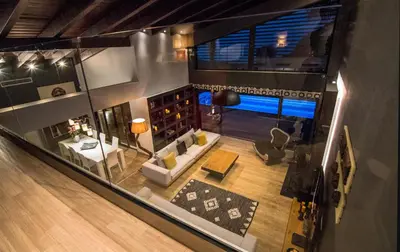 an overhead view of a living room with a couch and a table at Villa Equinox in Ixia