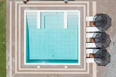 an overhead view of a swimming pool at Elysian Villa in Afantou