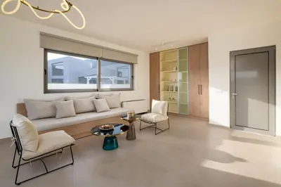 a living room with a couch and two chairs and a table at Pantheon Luxury Villas Rhodes Island in Afantou