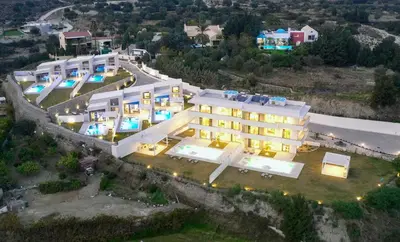 an aerial view of a building with lights at Pantheon Luxury Villas Rhodes Island in Afantou