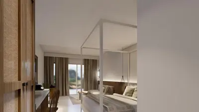 a bedroom with a canopy bed in a room at Lindos View Hotel in Líndos