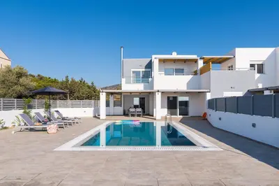 a view of a house with a swimming pool at South Beach Villas in Gennadi