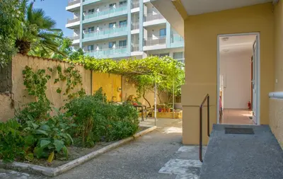 a hallway of a building with a building at Garden House Elli beach 2 min in Rhodes Town