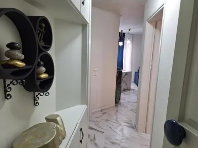 a bathroom with a mirror on the wall at Modern Quiet Apartment in the Center of Rhodes in Rhodes Town