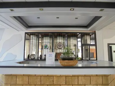 a window in a room with a counter with a plant at Asterias Bay-Theologos in Theologos