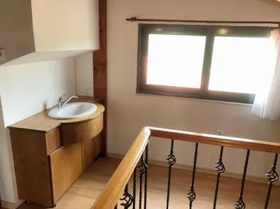 a bathroom with a sink and a window at Elena's Country Home & SPA in Kalithies