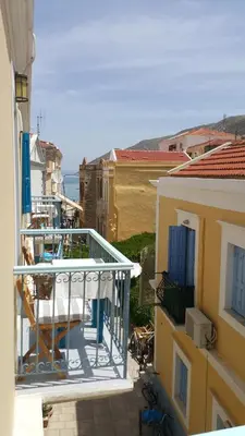 a view of a balcony from a building at Albatros in Symi