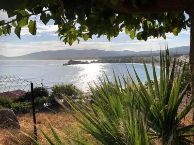 a view of the ocean from a beach at Skizenas Waterfront Apartments in Haraki
