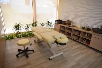 an office with a salon with a chair and a desk at LINDOS GARDENS RESORT COMPLEX in Líndos