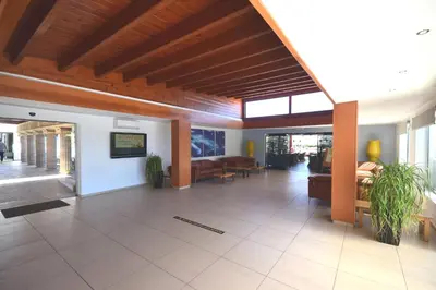 a lobby of a building with a wooden ceiling at LINDOS GARDENS RESORT COMPLEX in Líndos