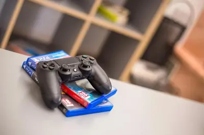 a couple of video game controllers sitting on a table at Pegasus Villa in Ialyssos