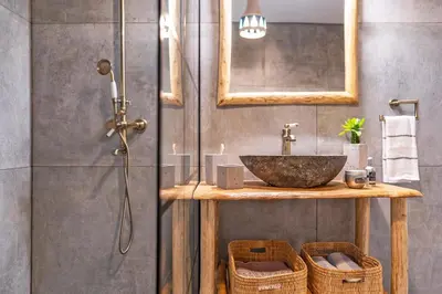 a bathroom with a sink and a shower at Onar Villa Kolympia in Kolimbia