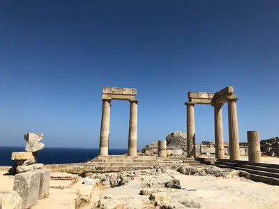 a group of columns on a hill with the ocean at Rhodes Archaggelos Retreat-Nest Among Garden in Archangelos