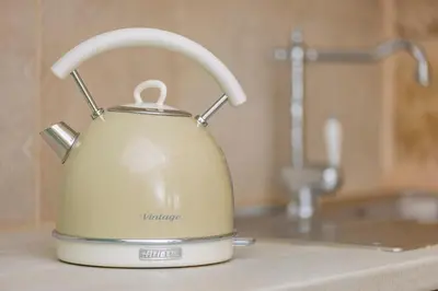 a tea kettle is sitting on a kitchen counter at Amarada City Suites in Rhodes Town