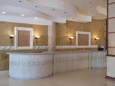 a lobby of a building with a waiting room at Atlantica Princess Hotel in Ixia