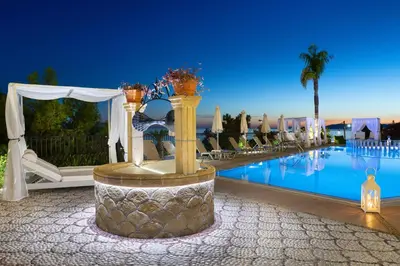 a resort with a swimming pool and a wedding altar at Pefkos View Apartments in Pefki Rhodes