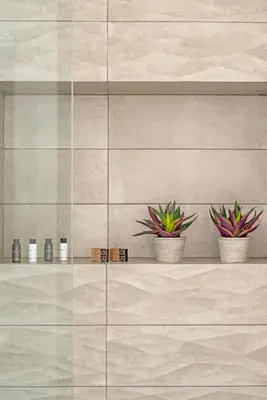 two potted plants sitting on a shelf in a bathroom at Amarada Marina Suites in Rhodes Town