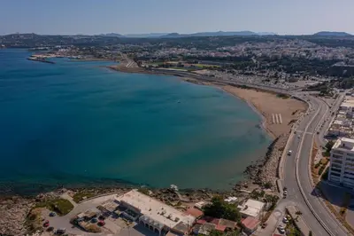 an aerial view of a beach and the ocean at Amarada Marina Suites in Rhodes Town