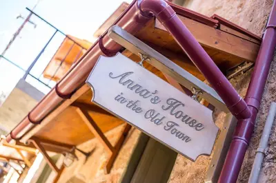 a sign on the side of a building at Anna's house in the Old Town in Rhodes Town