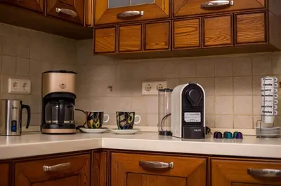 a kitchen counter with a coffee maker and a coffeemaker at MonaLisa Villa in Pefki Rhodes