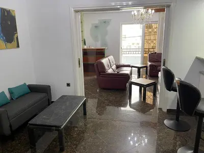 a living room with a couch and chairs and a table at NJ Apartments: The Island Edition in Rhodes Town