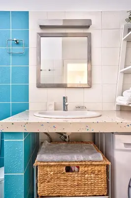 a bathroom with a sink and a mirror at Academia in Rhodes Town