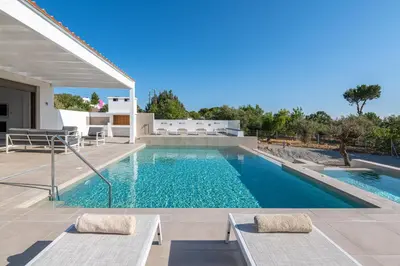 a swimming pool in a villa in positano at VILLA IRIS in PEFKOS, PINE VILLAS in Pefki Rhodes