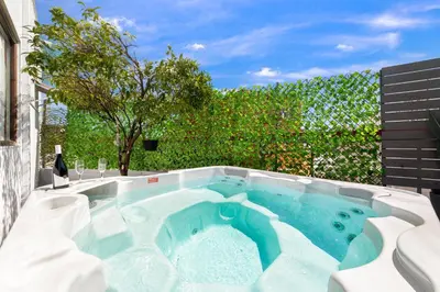 a swimming pool in the middle of a yard at Evi's Afandou Suite in Afantou