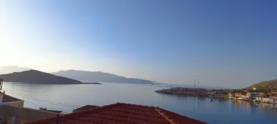 a view of a body of water with mountains at VILLA ELENA in Halki