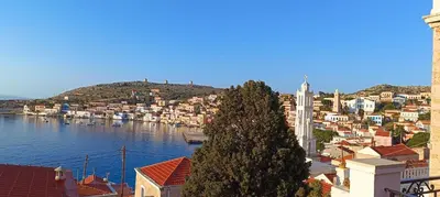 a view of a city and a body of water at VILLA ELENA in Halki