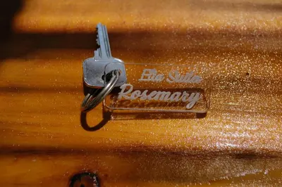 a metal key on the side of a suitcase at Elia Suites in Triánta