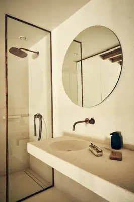 a bathroom with a sink and a mirror at AF Lindia Nature Design Hotel in Líndos