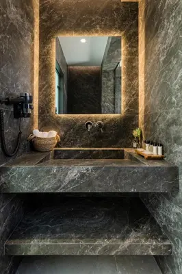 a bathroom with a sink and a mirror at Grand Blue Villas Lachania in Lachania