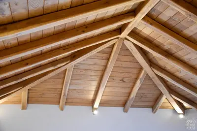 a close up of a wooden roof at 1890 Fanourakis House in Halki