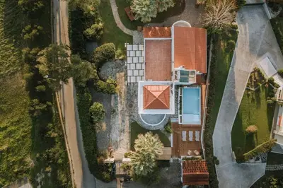 an overhead view of a house with a pool at Never Ending Summer Villa in Asgourou