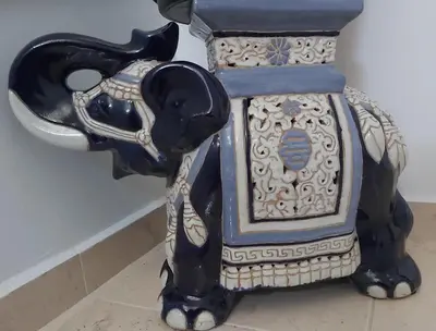 a figurine of an elephant with a house at ANTONIOS apartments in Archangelos