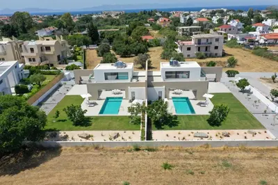 an aerial view of a house with a swimming pool at Aurum Villas in Ialyssos