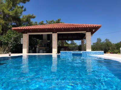 a swimming pool with a gazebo at Fiore di Rodi - Private Pool, Jacuzzi and Barbecue in Ialyssos