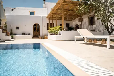 a villa with a swimming pool and a house at CasaCarma I, privater Pool, Boho-Design, Tradition in Lachania