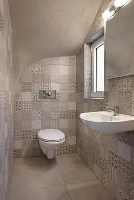 a bathroom with a toilet and a sink at Villa Pastida - Private Pool & Jacuzzi & Central place in Pastida