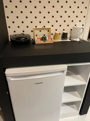 a black and white desk with a drawer at Jz Plus Picasso in Rhodes Town