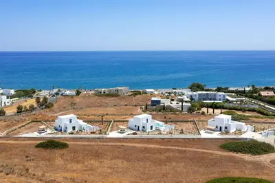 an aerial view of a town with the ocean at Seacarf Villa, 3 magnificent properties in Lachania beach, Bedrooms 12, Sleeps 27 in Lachania