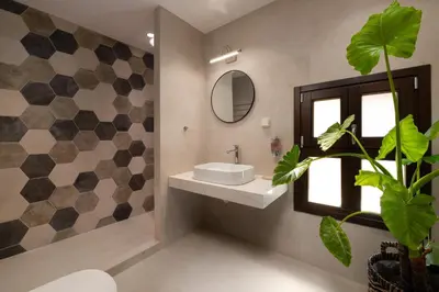 a bathroom with a sink and a mirror at San Antonio Luxury Apartments, Medieval Town in Rhodes Town
