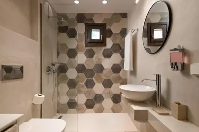 a bathroom with a sink and a toilet and a mirror at San Antonio Luxury Apartments, Medieval Town in Rhodes Town