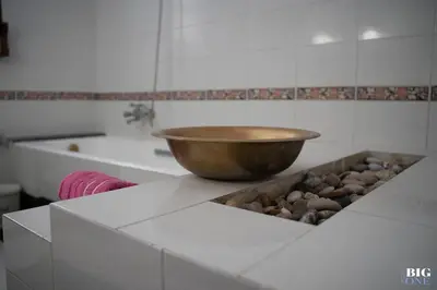 a bowl sitting on a counter in a bathroom at The BIG one!! in Rhodes Town