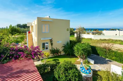 a small house with a view of the ocean at Litsas Studios in Phanaes