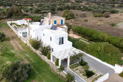 an aerial view of a white house at Dama Dama Villas in Gennadi